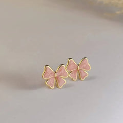 Peach bow studs